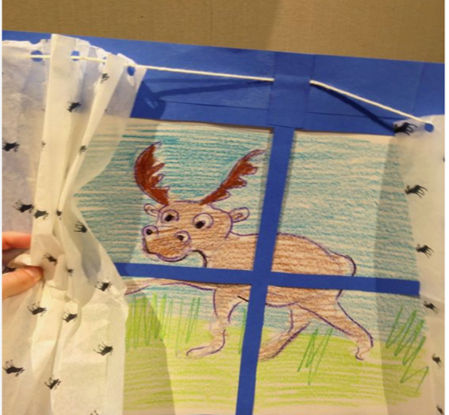 construction paper window with drawing of moose beneath