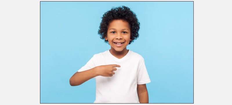 little boy pointing to himself