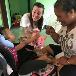 Marshall Volunteers with child